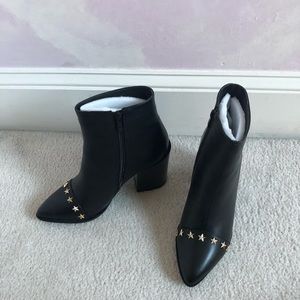 Star studded black boots from Nasty Gal